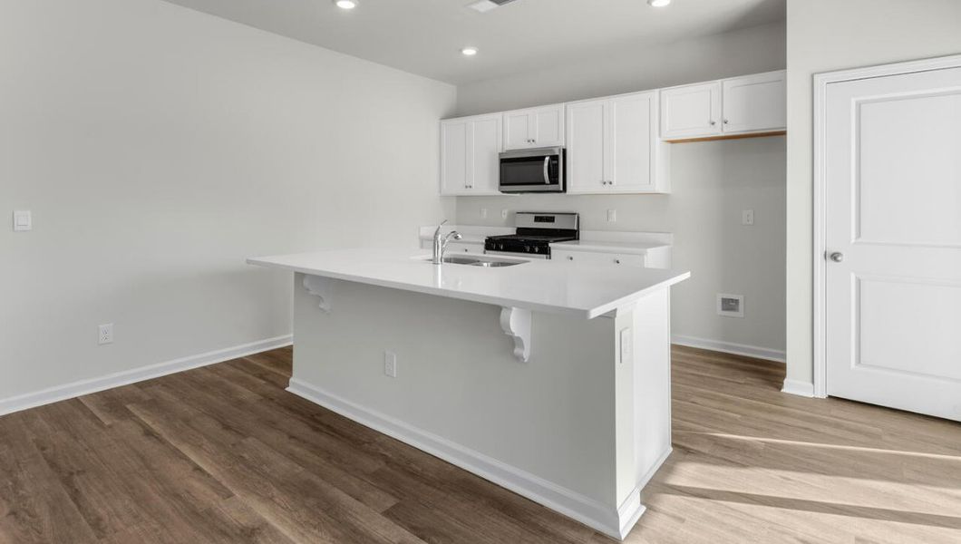 Representative furnished interior of a home built from the KERRY by D.R. Horton in Cedar Hill Landing, Navassa (Image 5).