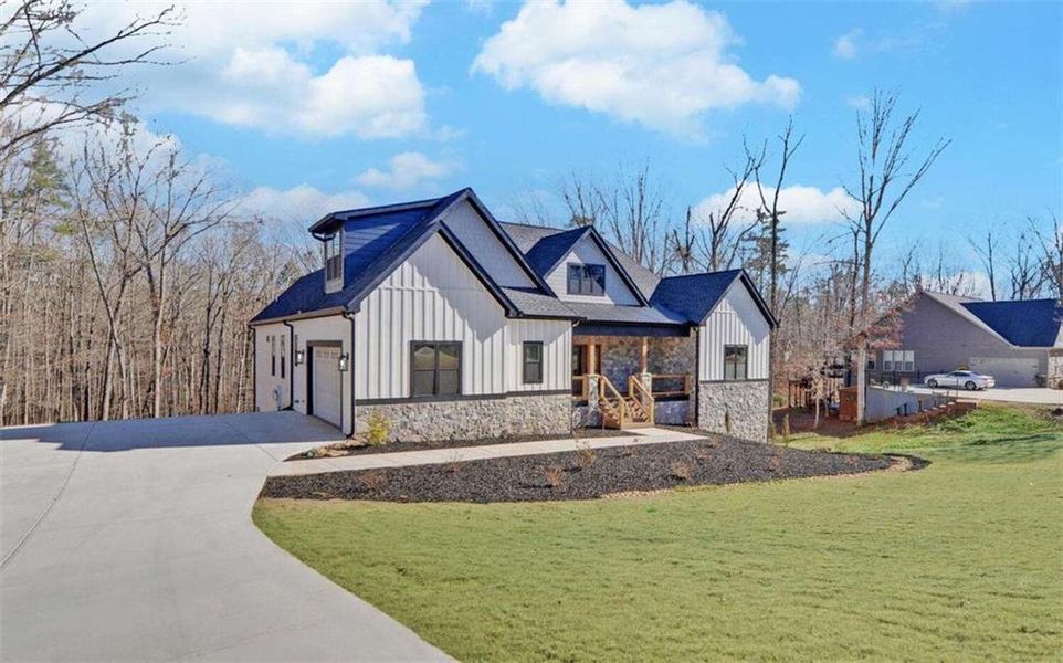 Front exterior of a new home in , Clarkesville, GA, highlighting curb appeal (Image 27).