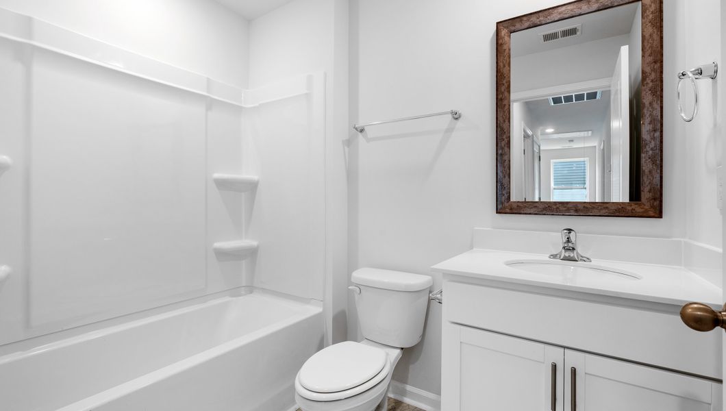 Furnished interior view inside a new home in Harper Ridge, Roebuck (Image 12).