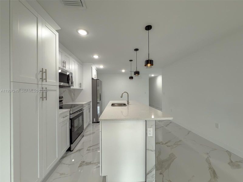 Furnished interior view inside a new home in , Lehigh Acres (Image 6).