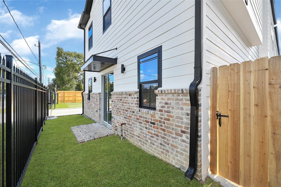 Exterior details and patio area of a home in , Houston (Image 19). Exterior details and patio area of a home in , Houston (Image 19).