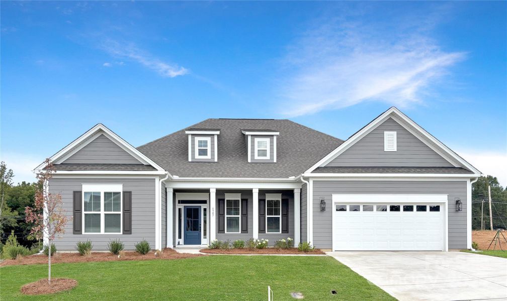 Front exterior of a new home in Brighton Park, Mount Pleasant, NC, highlighting curb appeal (Image 1).