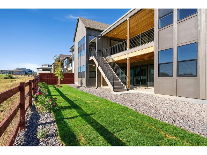 Exterior details and patio area of a home in RainDance, Windsor (Image 3).