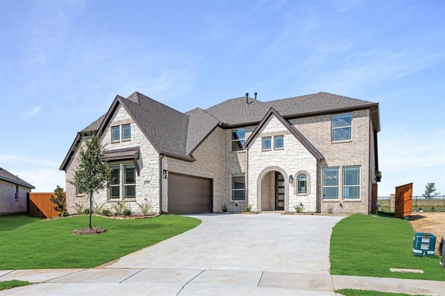 Front exterior of a new home in Timberbrook 3B-4A, Justin, TX, highlighting curb appeal (Image 25).