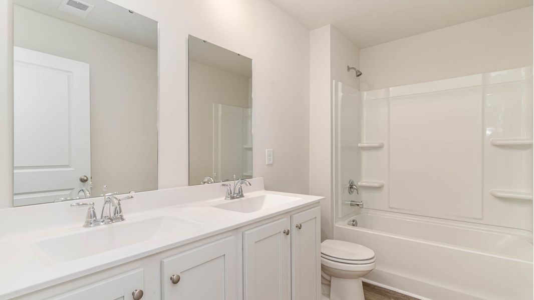 Furnished interior view inside a new home in The Bluffs at Mill Creek, Florence (Image 10). Furnished interior view inside a new home in The Bluffs at Mill Creek, Florence (Image 10).
