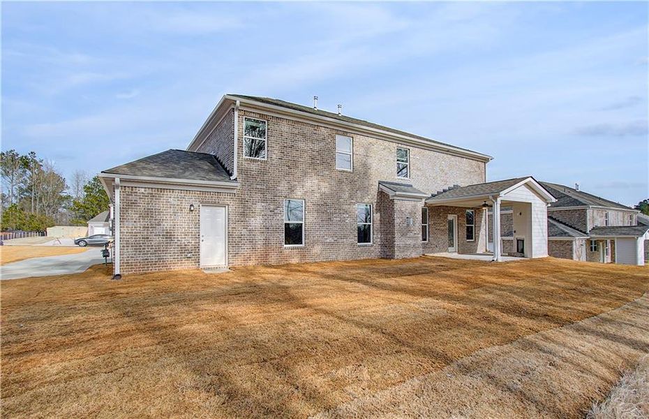 Exterior details and patio area of a home in Trinity Park, McDonough (Image 4).