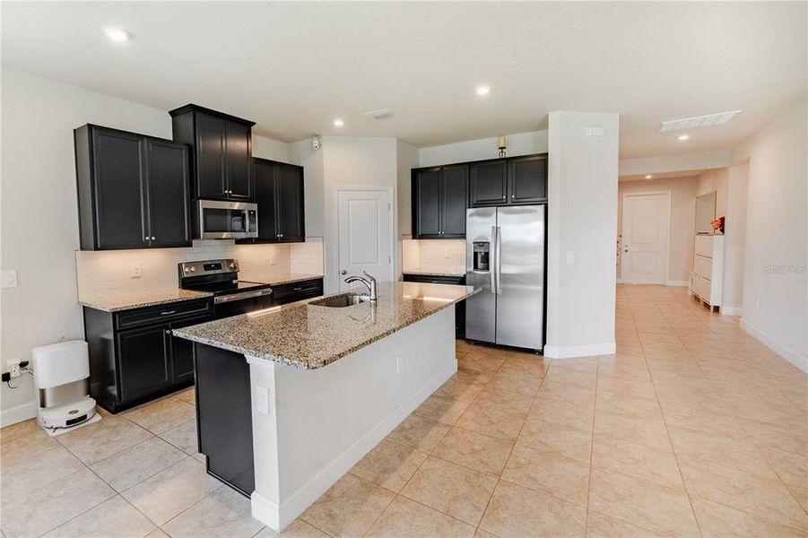 Furnished interior view inside a new home in , Port Charlotte (Image 12). Furnished interior view inside a new home in , Port Charlotte (Image 12).