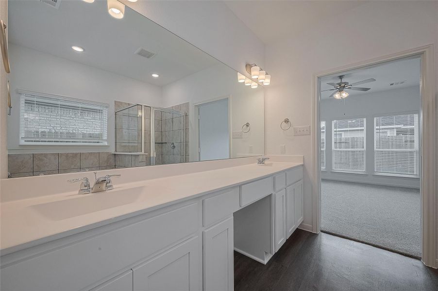 Furnished interior view inside a new home in Mill Creek Trails, Magnolia (Image 11).