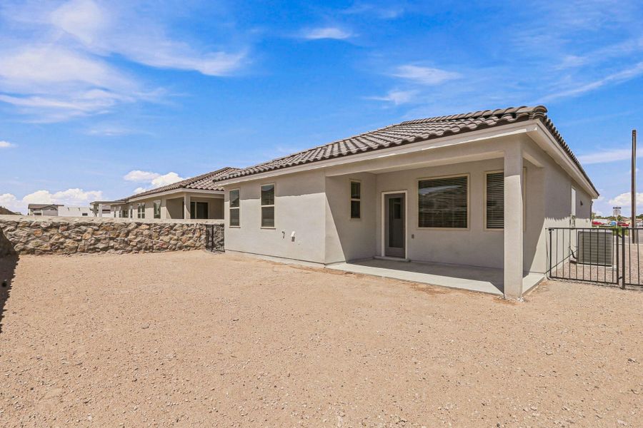 Exterior details and patio area of a home in Paseos Del Este, El Paso (Image 30).