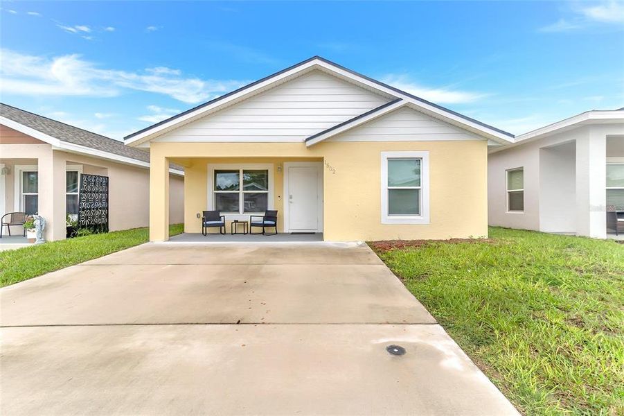 Front exterior of a new home in , Sebring, FL, highlighting curb appeal (Image 20).