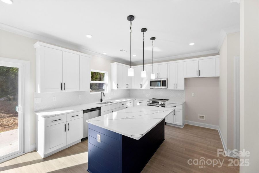 Furnished interior view inside a new home in , Huntersville (Image 5).