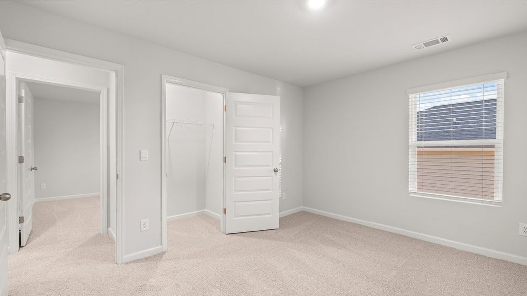 Spacious, unfurnished interior of a new home in Southwind Village, Evans (Image 44).