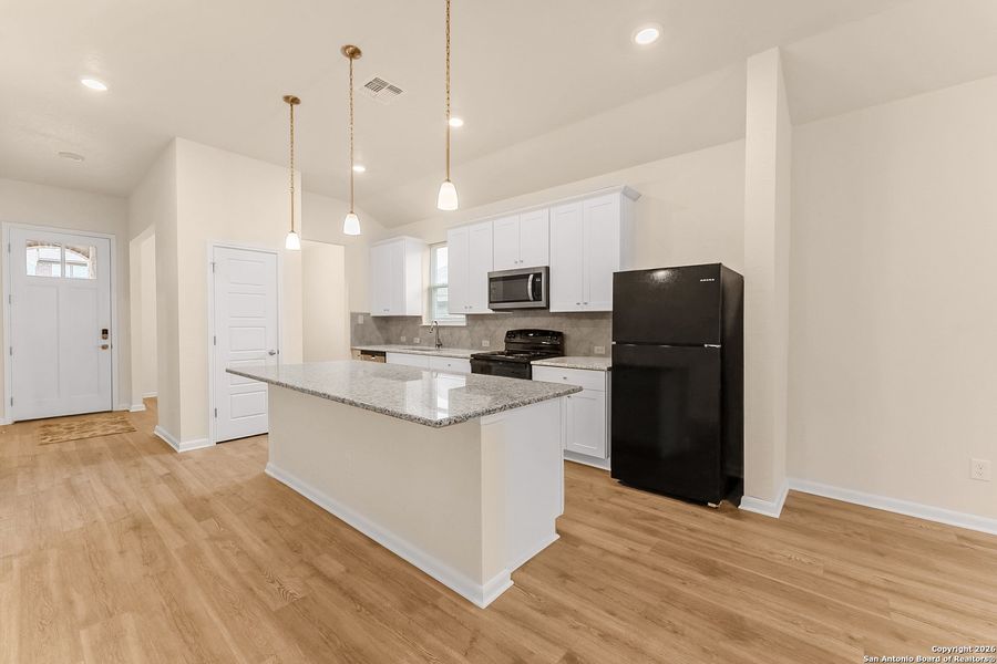 Furnished interior view inside a new home in Bricewood, San Antonio (Image 9).