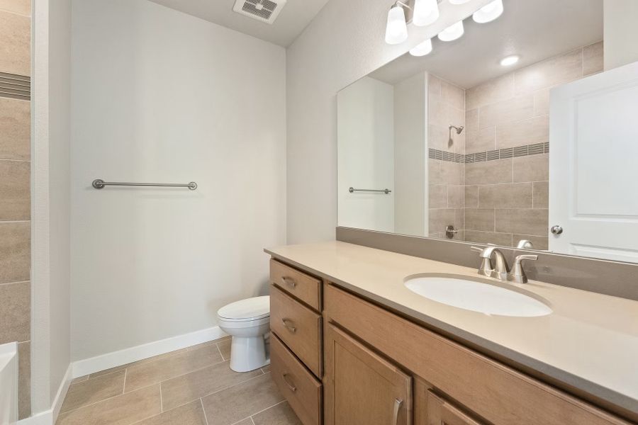 Furnished interior view inside a new home in The Lakes at Centerra - Discovery, Loveland (Image 7).