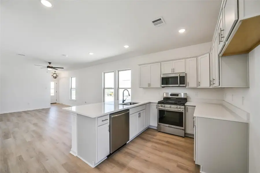 Furnished interior view inside a new home in Mostyn Springs, Magnolia (Image 8). Furnished interior view inside a new home in Mostyn Springs, Magnolia (Image 8).