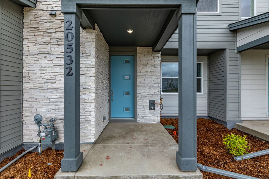 Front exterior of a new home in Painted Prairie, Aurora, CO, highlighting curb appeal (Image 20). Front exterior of a new home in Painted Prairie, Aurora, CO, highlighting curb appeal (Image 20).