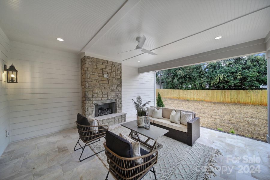 Large back patio includes ventless gass fireplace.