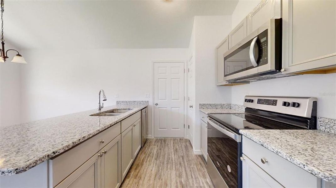 Furnished interior view inside a new home in , Dunnellon (Image 9).