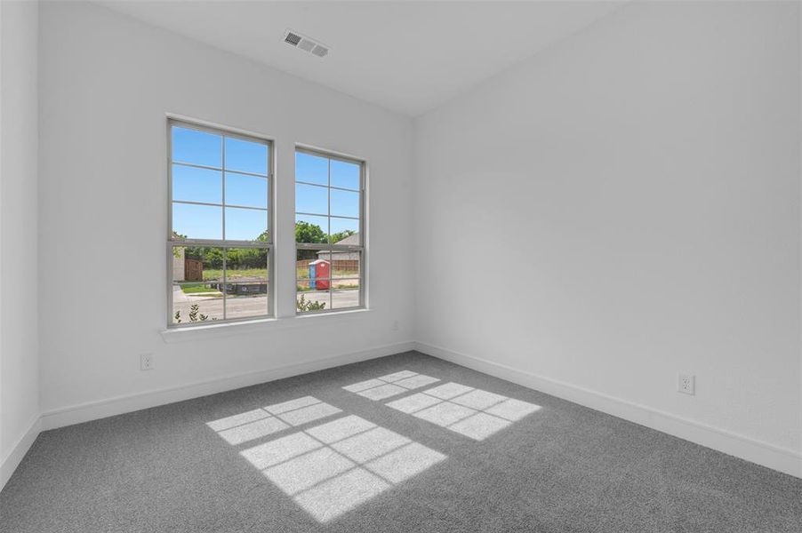 Spacious, unfurnished interior of a new home in Wellington, Haslet (Image 23).