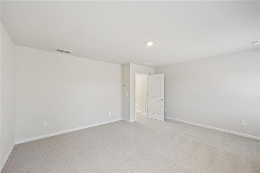 Spacious, unfurnished interior of a new home in Creekside at Oxford Park, Fairburn (Image 36).