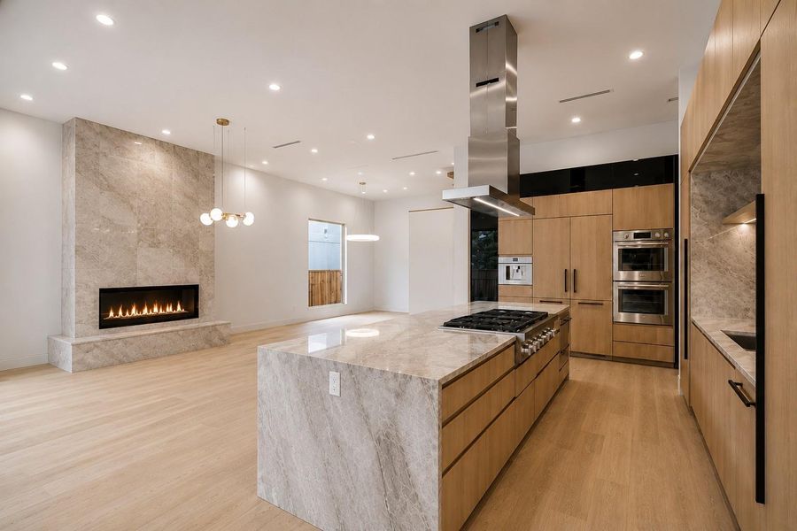 Fireplace wall shown with optional surround/hearth rendering — builder can complete as shown prior to closing; inquire for pricing.