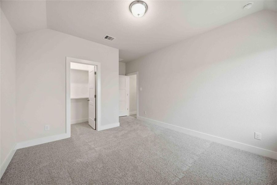 Spacious, unfurnished interior of a new home in Ellwood, Iowa Colony (Image 15).