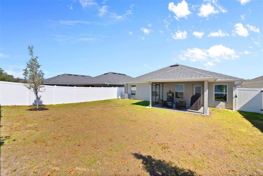 Exterior details and patio area of a home in Pine Bluff, Spring Hill (Image 26).