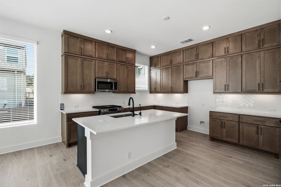 Furnished interior view inside a new home in Centero at Stone Oak, San Antonio (Image 7).