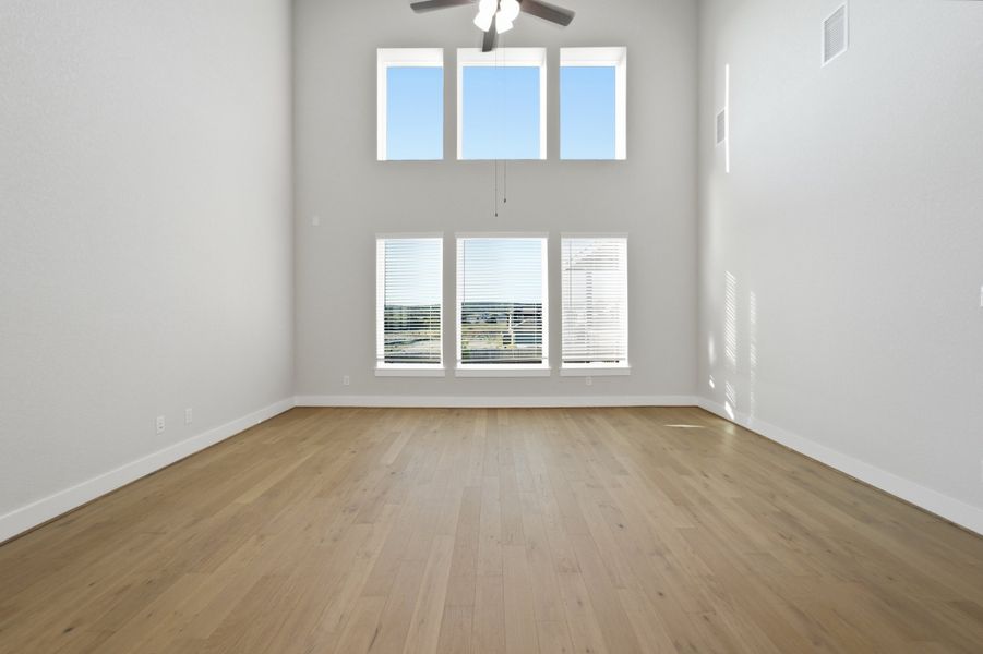 Spacious, unfurnished interior of a new home in The Woodlands at Medina Hills, Mico (Image 30).