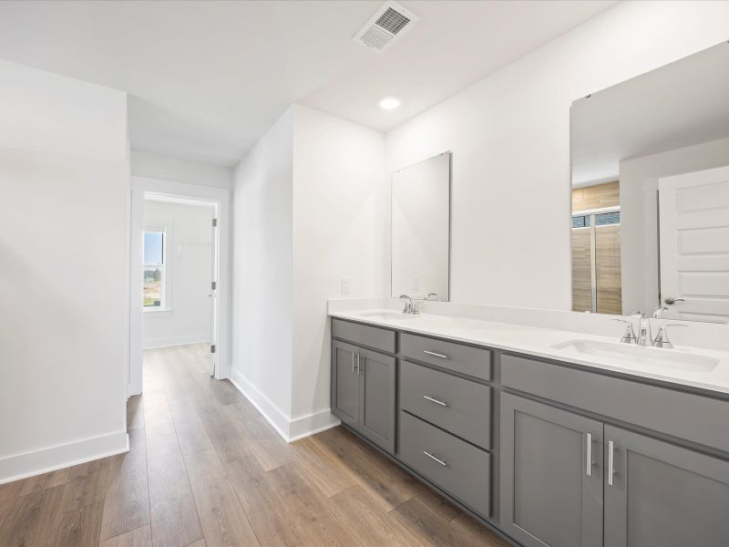 Furnished interior view inside a new home in The Coves at Lakes of Cane Bay, Summerville (Image 10).