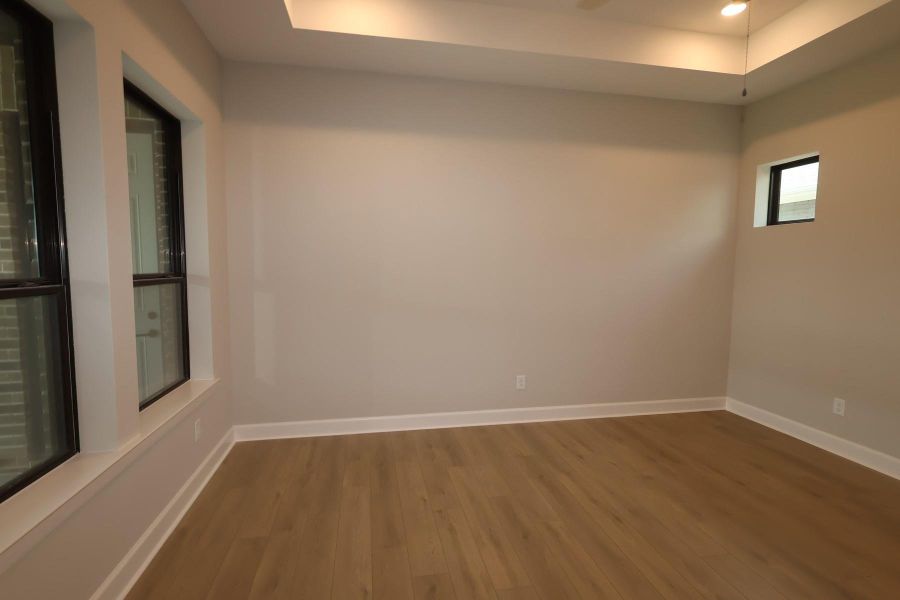Spacious, unfurnished interior of a new home in Riceland - Enclave Row Collection, Mont Belvieu (Image 7). Spacious, unfurnished interior of a new home in Riceland - Enclave Row Collection, Mont Belvieu (Image 7).