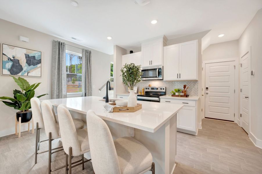 Representative furnished interior of a home built from the Vienna by Mattamy Homes in Ashmore Townes, Garner (Image 13).