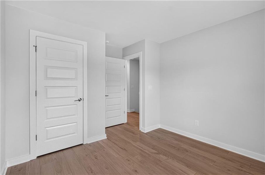Spacious, unfurnished interior of a new home in The Cottages at East Lanier, Fayetteville (Image 22).