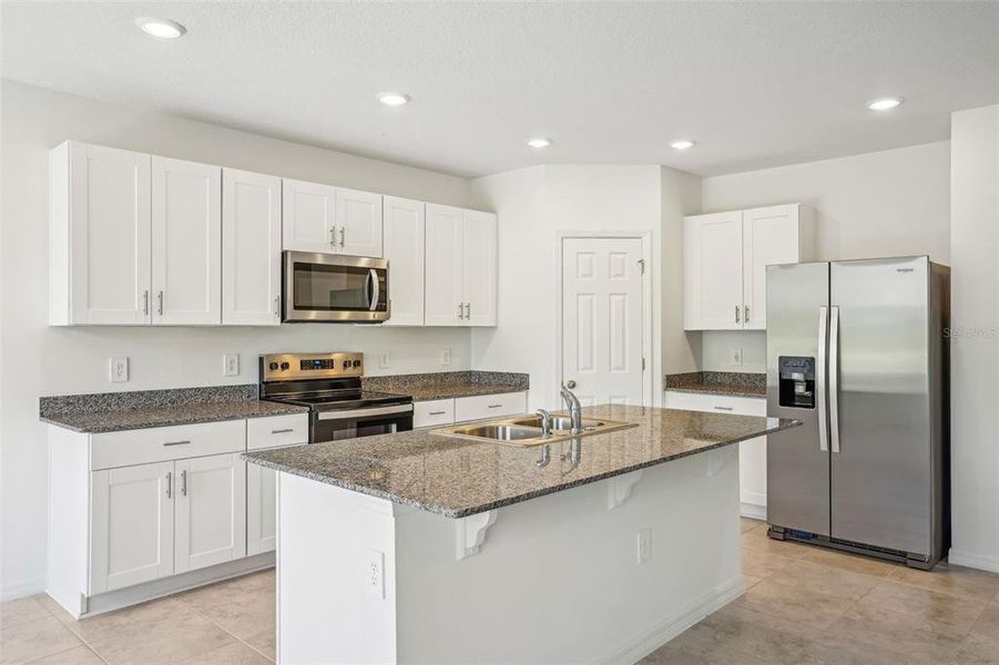 Furnished interior view inside a new home in Lake Deer Estates - Signature Series, Poinciana (Image 17). Furnished interior view inside a new home in Lake Deer Estates - Signature Series, Poinciana (Image 17).