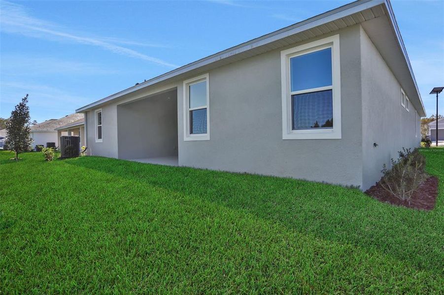 Exterior details and patio area of a home in Angeline, Land O' Lakes (Image 3).