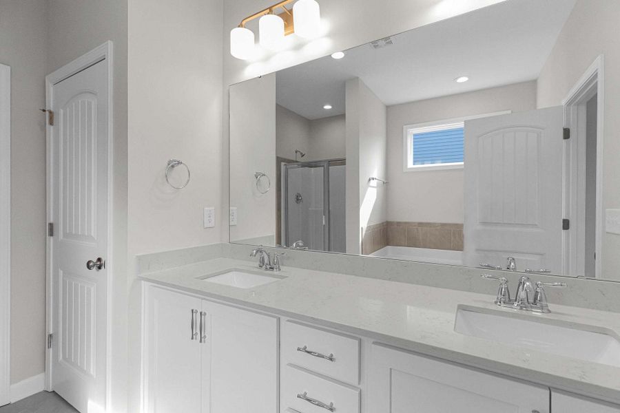 Representative furnished interior of a home built from the Clayton by Caviness & Cates Communities in Bartlett Manor, Youngsville (Image 189).