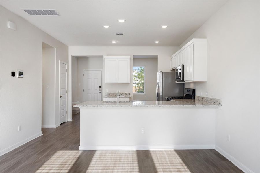 Furnished interior view inside a new home in Avery Centre, Round Rock (Image 8).