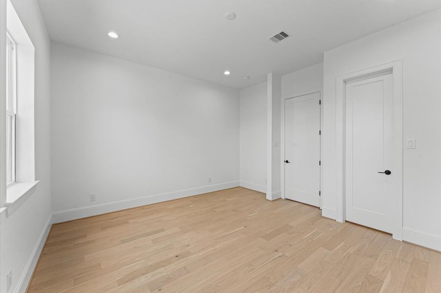 Secondary bedroom. *Previous Brownstone Living project, selections and floor plans may vary.*