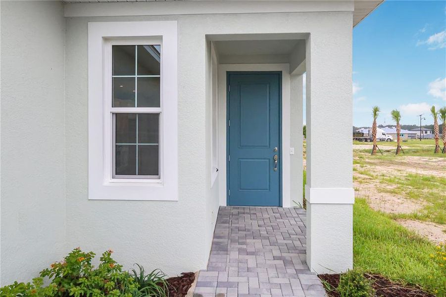 Exterior details and patio area of a home in Cresswind at Hammock Oaks, Lady Lake (Image 3).