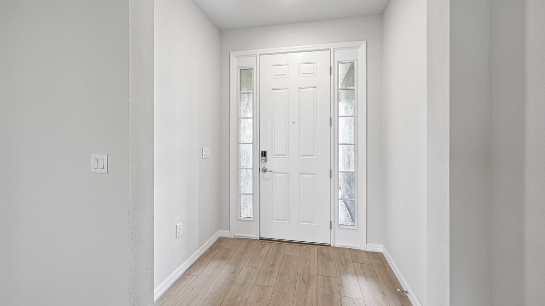 Representative unfurnished interior of a home built from the Laurel by D.R. Horton in Star Farms at Lakewood Ranch, Bradenton (Image 13).