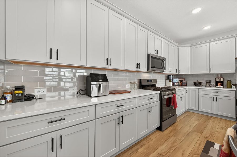 Furnished interior view inside a new home in Sunterra, Katy (Image 38).