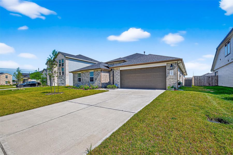 Exterior details and patio area of a home in Windstone on the Prairie, Richmond (Image 19).