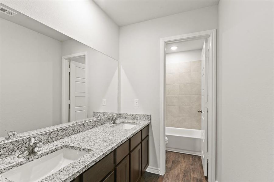 Furnished interior view inside a new home in Retreat at Fossil Creek, Fort Worth (Image 5).