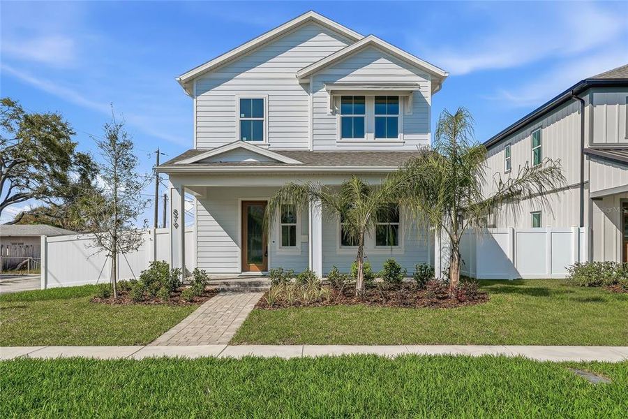 Front exterior of a new home in , St. Petersburg, FL, highlighting curb appeal (Image 26).