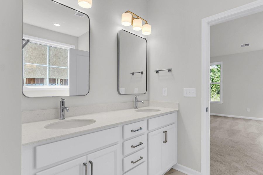 Furnished interior view inside a new home in Tidewater at Lakes of Cane Bay, Summerville (Image 9). Furnished interior view inside a new home in Tidewater at Lakes of Cane Bay, Summerville (Image 9).