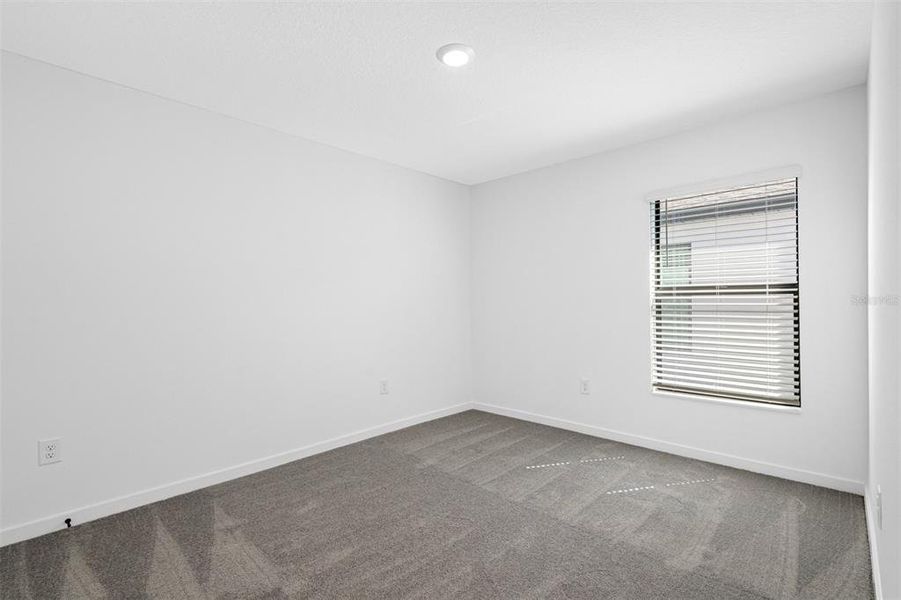 Spacious, unfurnished interior of a new home in Royal Highlands, Brooksville (Image 3).