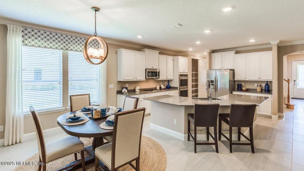 Furnished interior view inside a new home in Silver Falls Single Family at SilverLeaf: Silver Falls 60s at SilverLeaf, St. Augustine (Image 8).