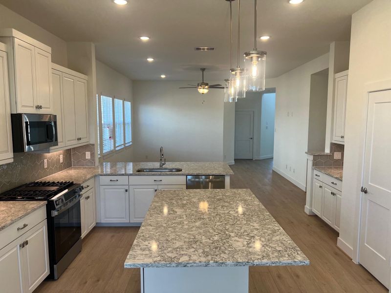 Furnished interior view inside a new home in Wood Leaf Reserve, Tomball (Image 11).