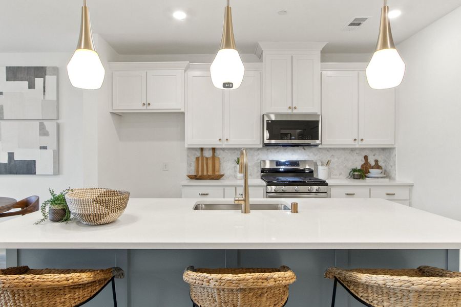 Representative furnished interior of a home built from the Blaze (FE) by Grenadier Homes in Wildridge, Oak Point (Image 4).