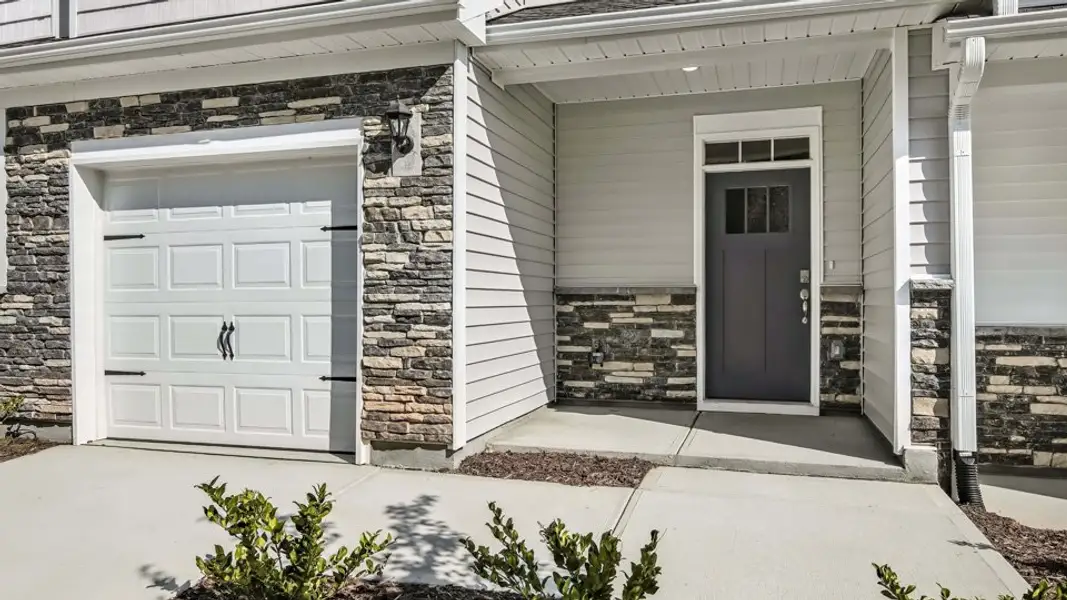 Representative exterior photo of a completed home built from the LANSING - TRADITIONS by D.R. Horton in Chapel Townes, Raleigh, NC (Image 16).